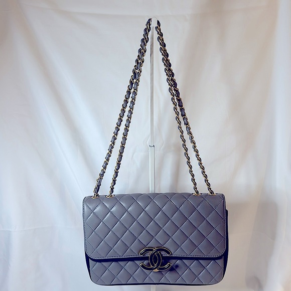 NWOT CHANEL TWO TONE DOUBLE FLAP BAG
GRAY AND BLACK WITH LEATHER COVERED
CC - Picture 2 of 8